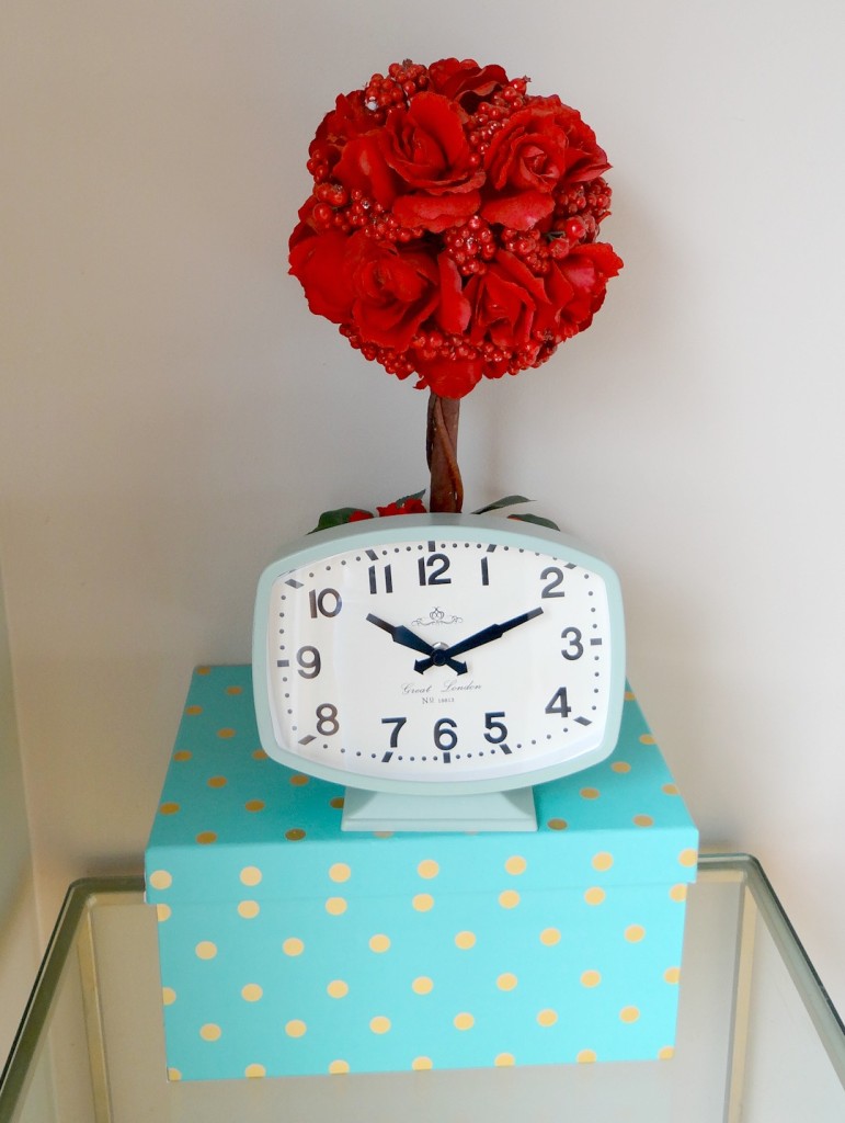 Teal clock in dining room
