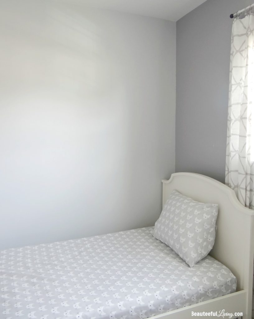 White Twin Bed with sheets